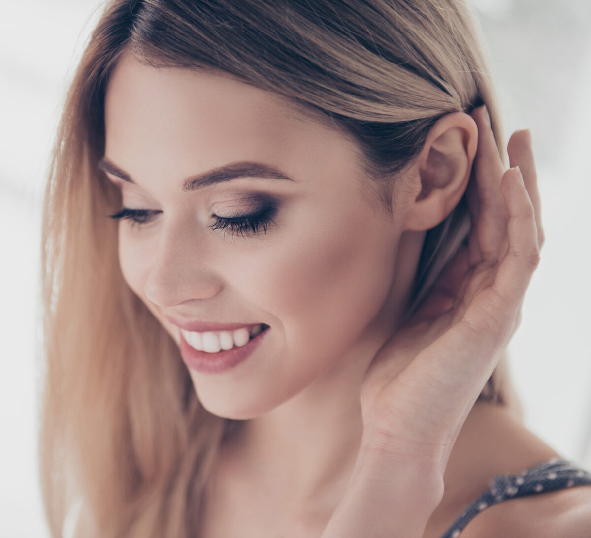 Close up portrait of successful, pretty, charming, gorgeous, cheerful, cute, modern, naked, nude, natural, positive, correcting her hair behind ear, skincare, bodycare, healthcare concept Environ Skincare in McLean, VA
